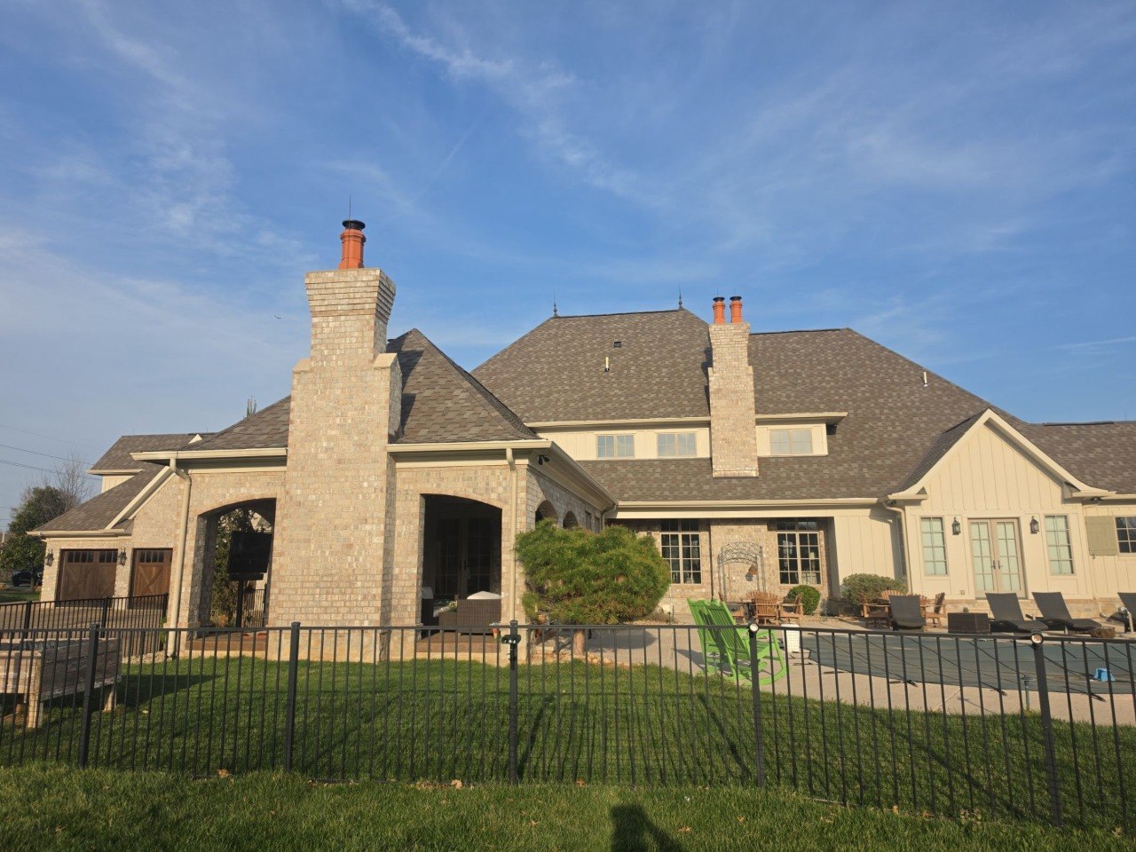 Aerial view of luxury home roof replacement — Wildwood, MO